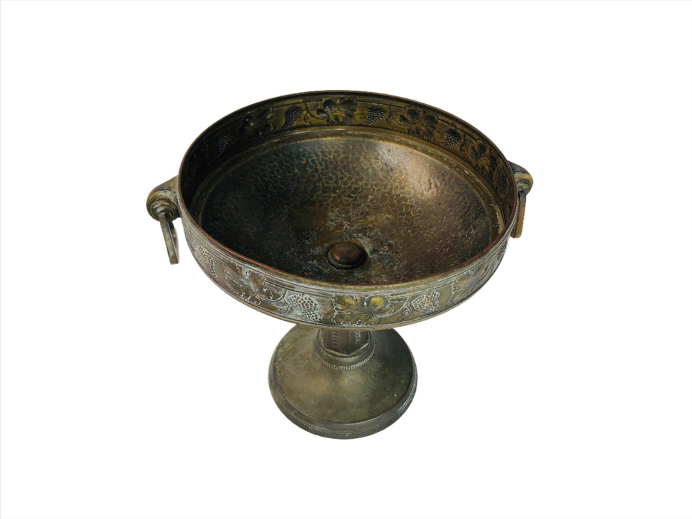 
                  
                    WMF – German Hammered Brass Two-Handled Standing Fruit Bowl (17381)
                  
                