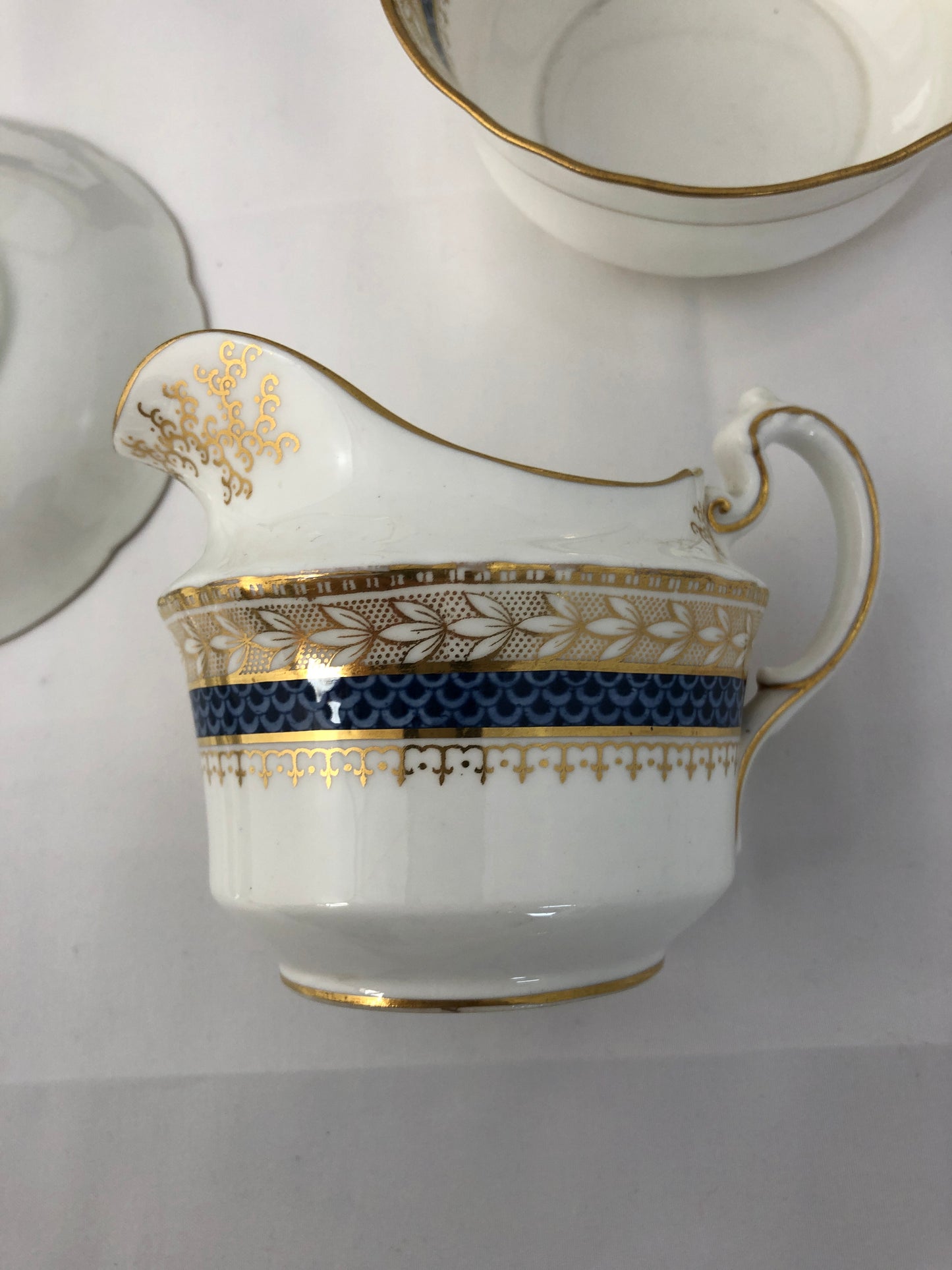 
                  
                    Aynsley Gold,Blue & White Teacups,Creamer  (20269)
                  
                