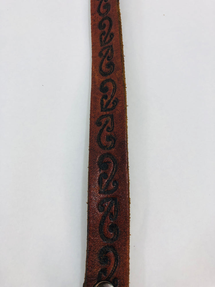 
                  
                    Small Leather Belt with Maori Design (21680)
                  
                
