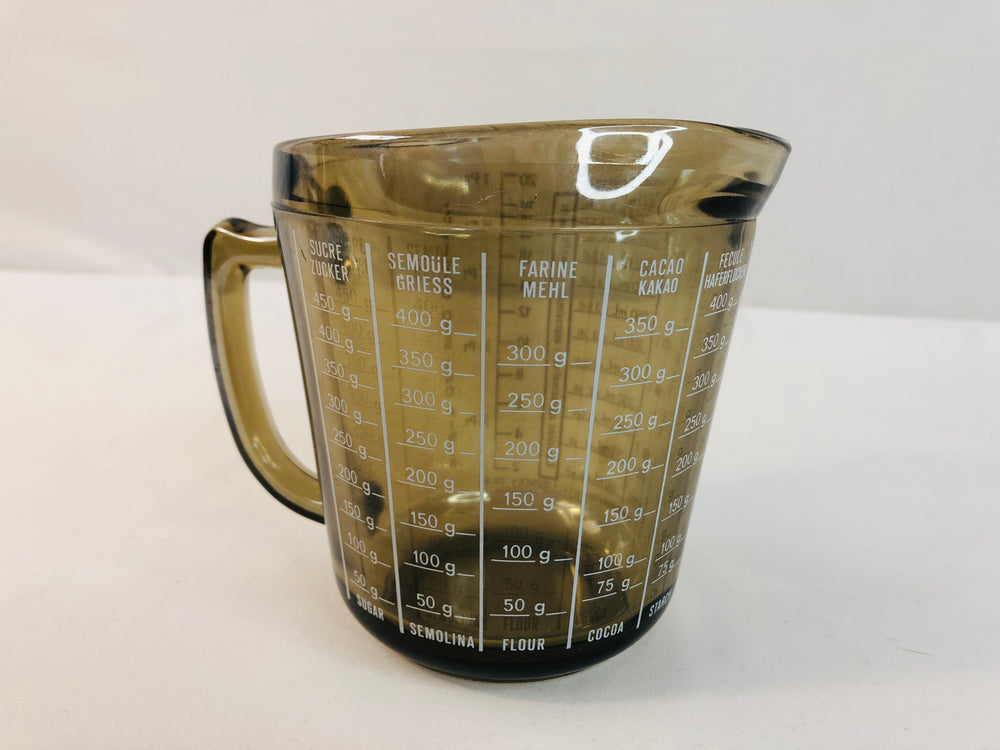 
                  
                    Vintage German-English Measuring Cup (18132)
                  
                