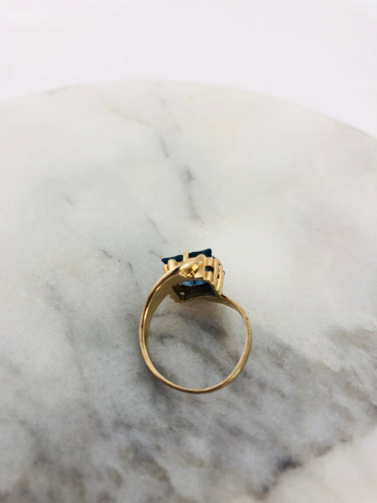 
                  
                    10K Gold Ladies Ring with Stunning Blue Gemstone (21591)
                  
                