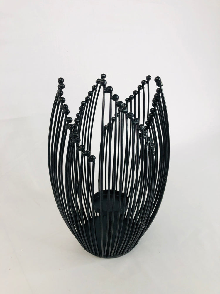 
                  
                    Designer Metal Candle Holder (16001)
                  
                