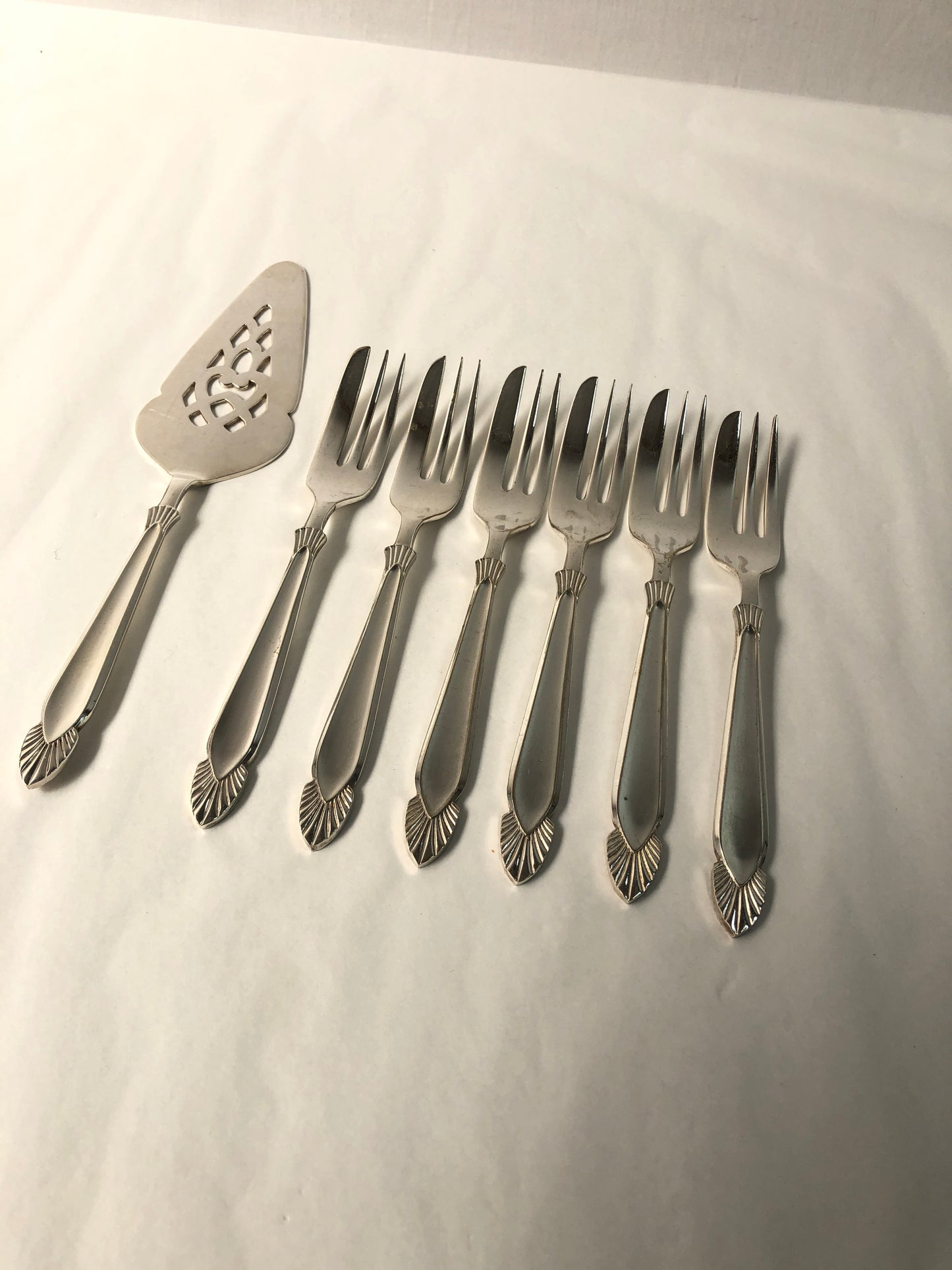 
                  
                    Angora Silver Plate Art Deco Look Cake Forks and Server (16175)
                  
                
