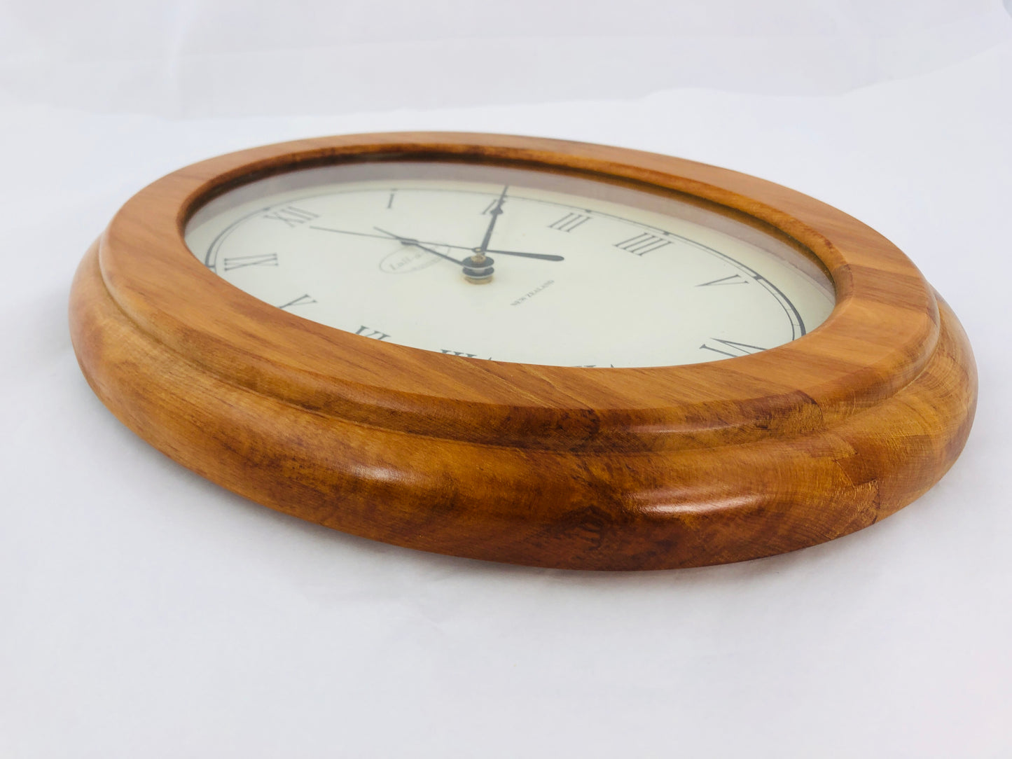 
                  
                    Lull-A-Bye Woodware Rimu Oval Clock (21893)
                  
                