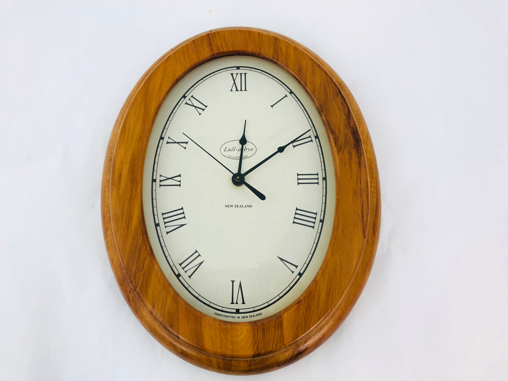 Lull-A-Bye Woodware Rimu Oval Clock (21893)