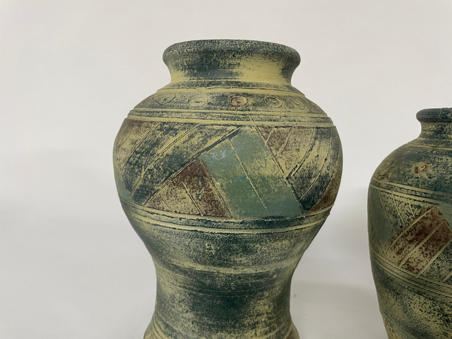 
                  
                    Two Matt Finished Pottery Vases (14118)
                  
                