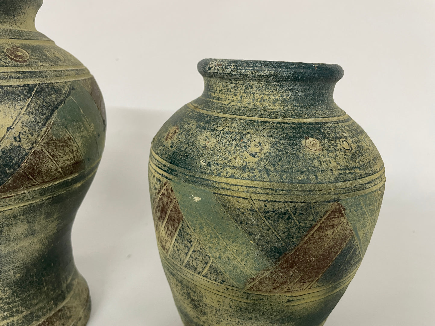 
                  
                    Two Matt Finished Pottery Vases (14118)
                  
                